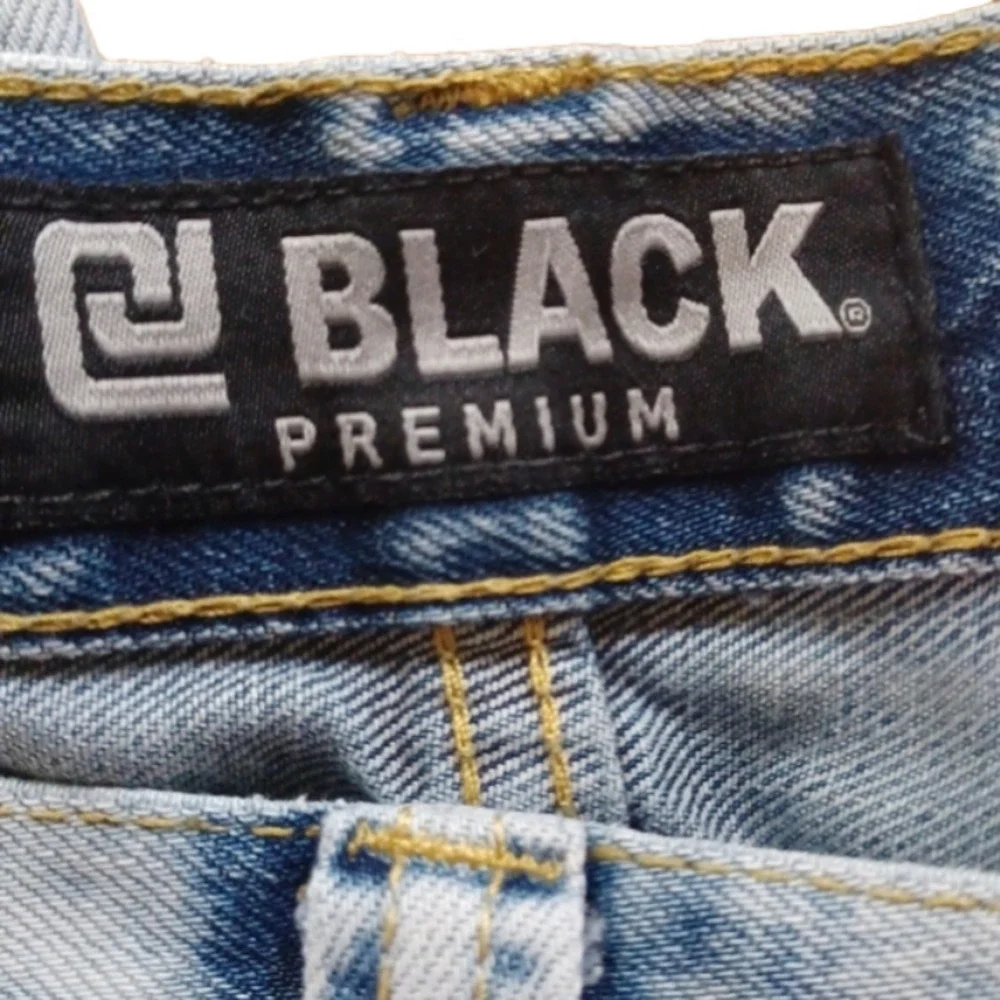 Black brand super distressed, acid wash looking jeans.Size 30x32.